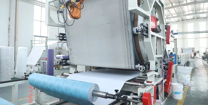 Hook and loop backing system quality control - precision bonding for sanding disc manufacturing