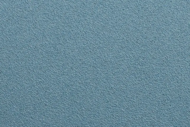 Abrasive grain distribution on sanding disc