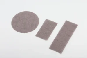 Brown round and rectangular aluminum oxide sanding discs, mesh pads, white background, e-commerce catalog photo