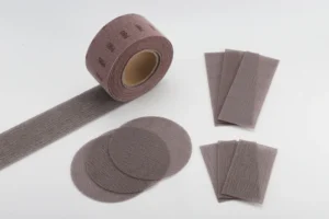 Aluminum oxide sanding disc product image on white background, mesh jumbo roll, red-brown color, e-commerce ready