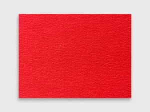 White background product image of a red ceramic sanding disc, cloth backing, jumbo roll, high-performance abrasive