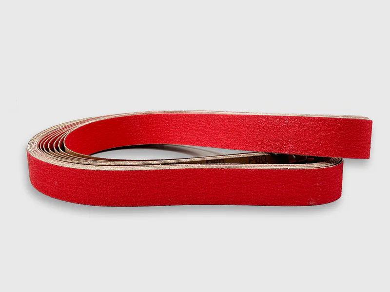 E-commerce product image of red ceramic sanding disc jumbo roll with cloth backing, white background