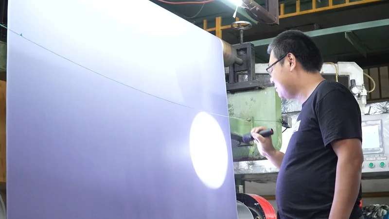 Flatness and surface condition checks for abrasive rolls