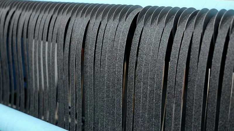 Reducing waste through stable abrasive roll quality and consistent supply