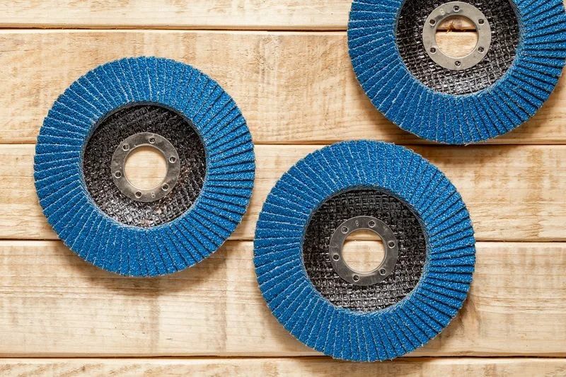 Flap disc stable performance under heavy industrial grinding pressure