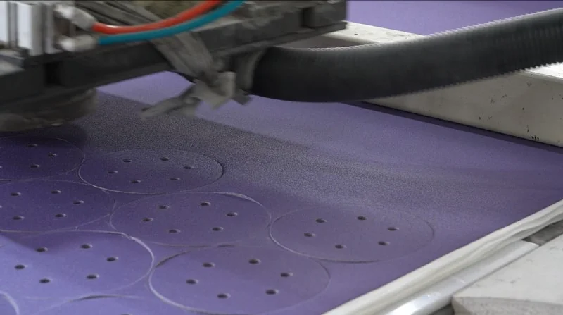 Abrasive roll conversion and slitting into sheets and discs