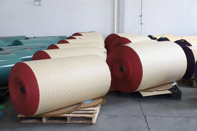 Full width abrasive roll