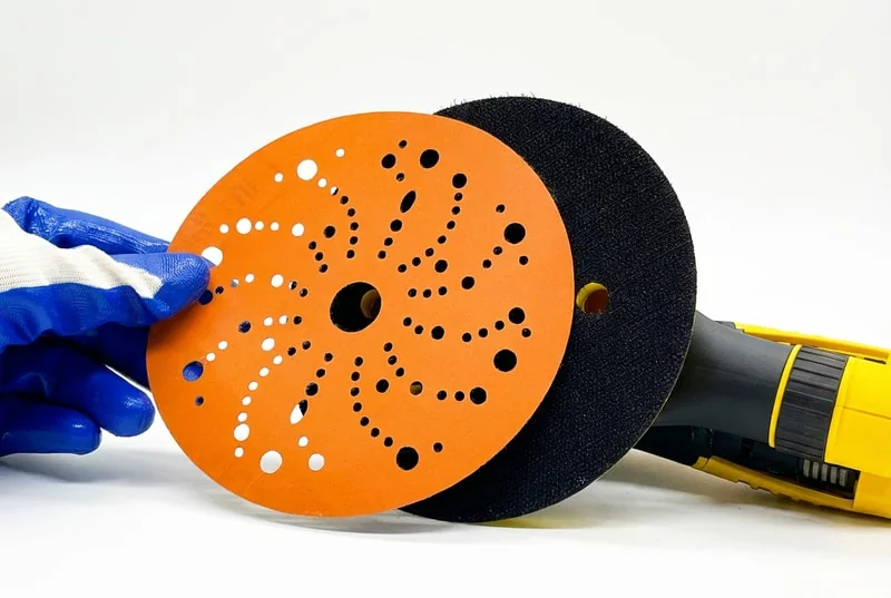 Hook and loop sanding discs for automotive refinishing