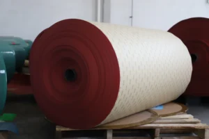 Orange sanding disc product image, ceramic abrasive, jumbo roll, white background, e-commerce catalog photo