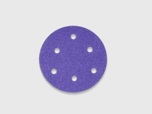 Purple sanding disc product image, zirconia alumina abrasive, multiple dust extraction holes, white background