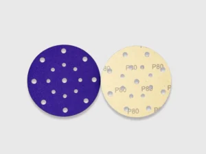 Purple and beige zirconia alumina sanding discs with multiple holes, e-commerce product image