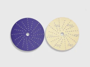 Purple zirconia alumina sanding discs with perforations and grit markings, white background product image