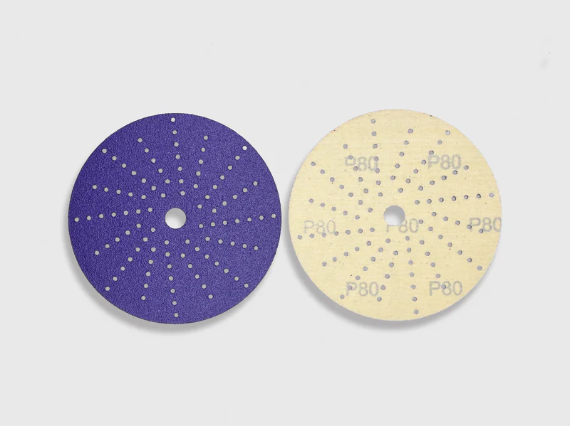Purple zirconia alumina sanding discs with perforations and grit markings, white background product image