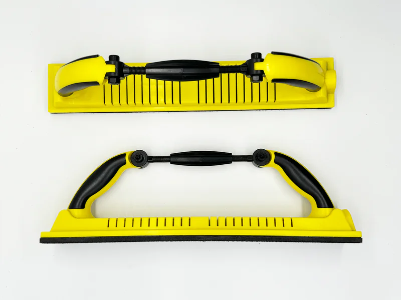 Yellow and black sanding block product image, ergonomic handle, aluminum oxide abrasive, e-commerce ready