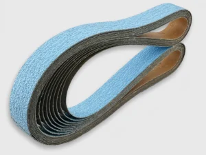 Blue zirconia abrasive cloth sanding belts looped stack product image, e-commerce ready, professional catalog photo